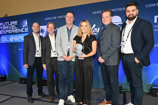 Aurrigo International’s Tenille Houston (centre) picks up the ‘Best New Transformative Concept’ Award 