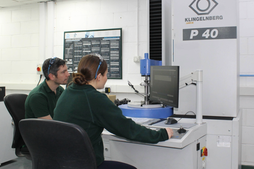 Xtrac's Martin Carrick and Teagan Kell using Klingelnberg P40 Measuring Equipment at the company's UK HQ